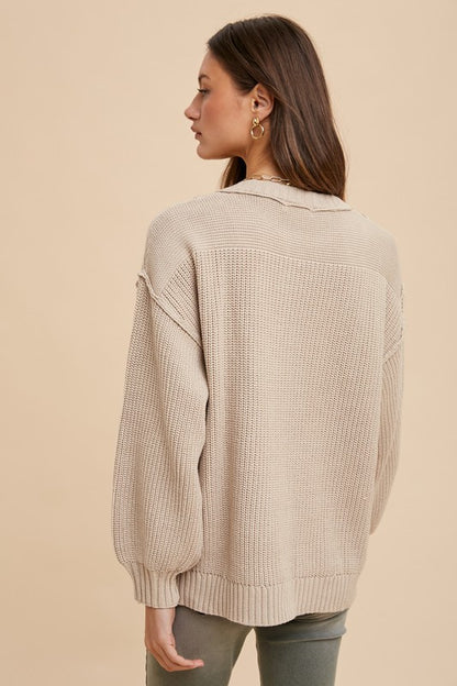 Half Button Ribbed Hem Sweater