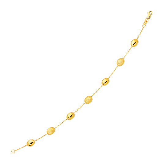 14k Yellow Gold Bracelet with Textured & Polished Pebble Stations (6.35 mm)